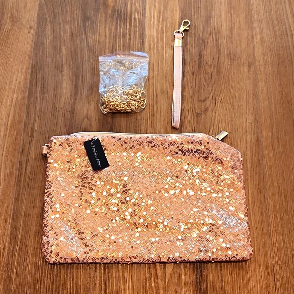 Brand new pink clutch with rose gold sequins